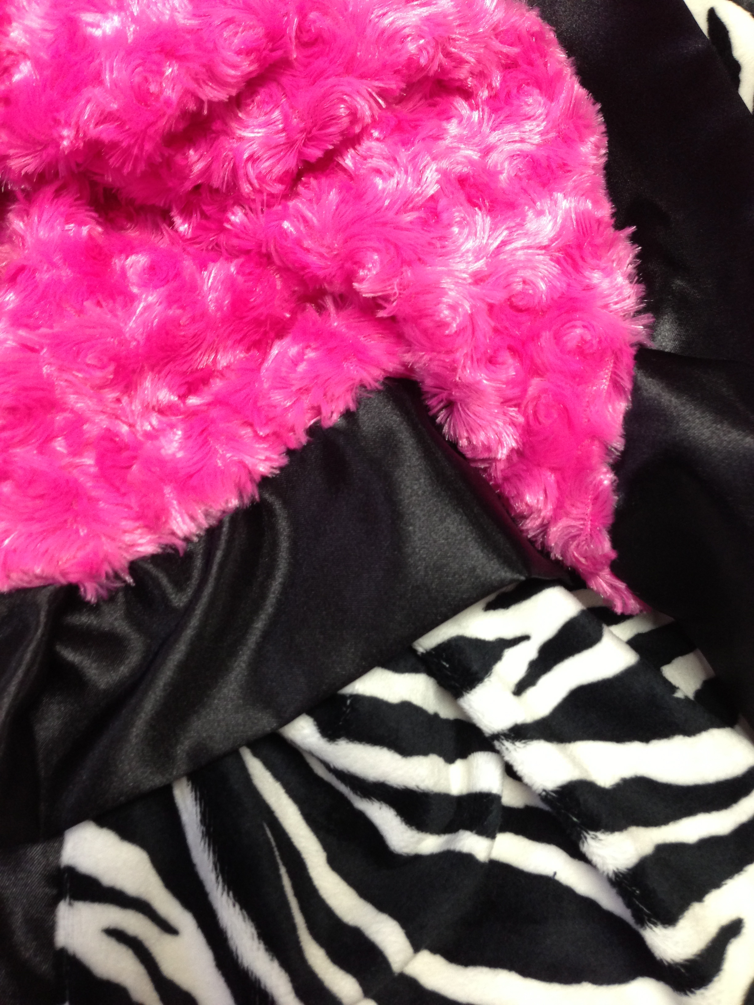 zebra blanket with pink trim